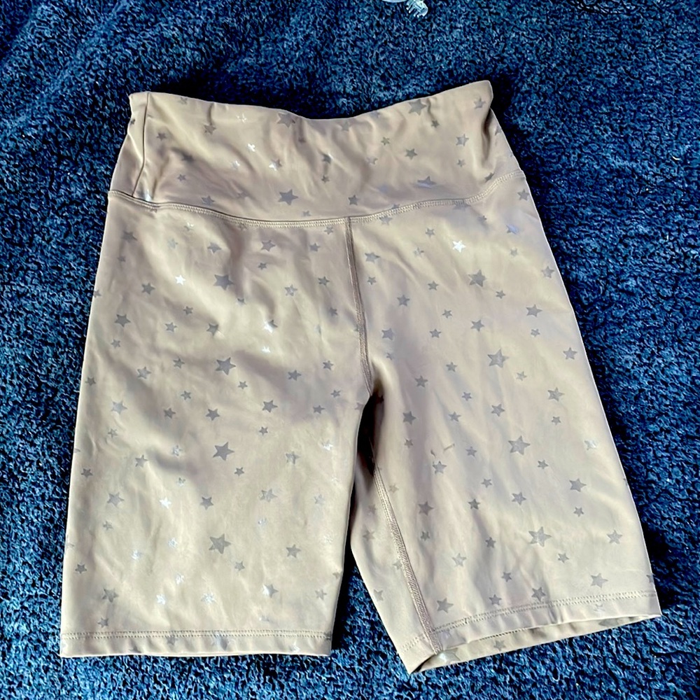 Light gray shorts with dark gray stars